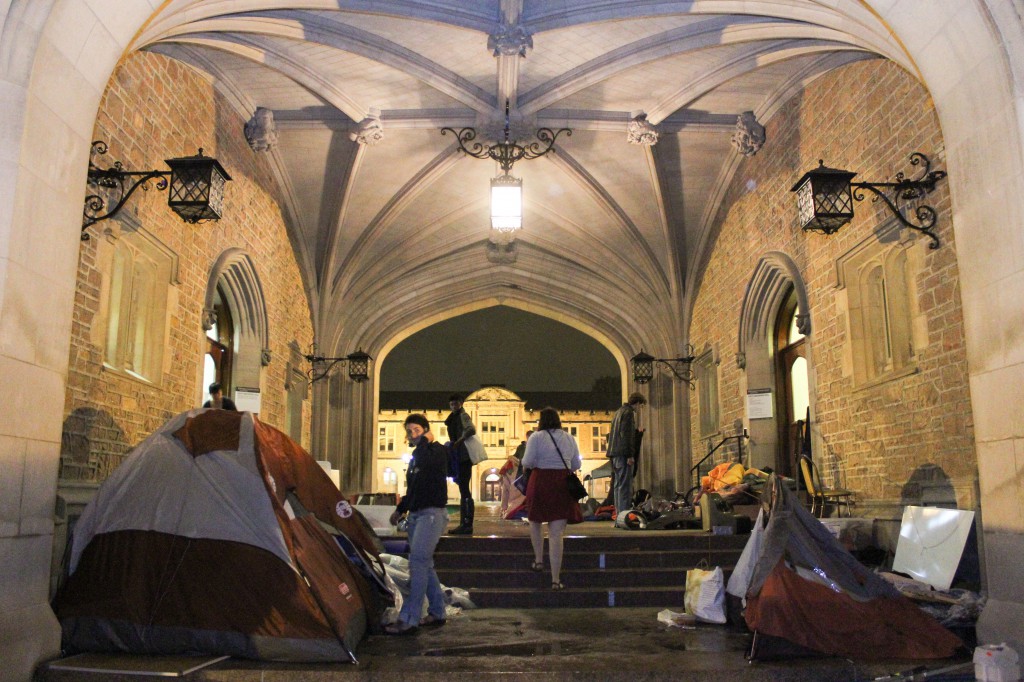 Participants of the April 2014 Brookings sit-in camp out outside Brookings Hall. Chancellor Wrighton recently announced that Washington University would not divest from fossil fuel companies, an announcement that comes in response to requests by Fossil Free WashU, the same group which called for Boyce’s removal.