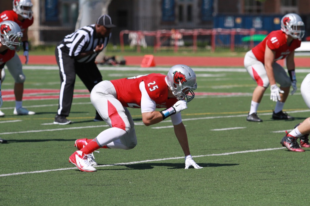 Without a conference, life goes on for football players