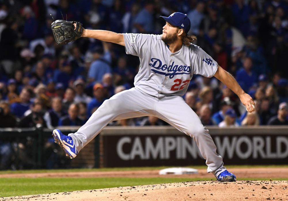 Los Angeles Dodgers ace Clayton Kershaw pitches the ball against the Chicago Cubs in the first inning during Game 5 of the National League Championship Series at Chicago’s Wrigley Field on Thursday, Oct. 19, 2017. The Dodgers won to secure their spot in the World Series.