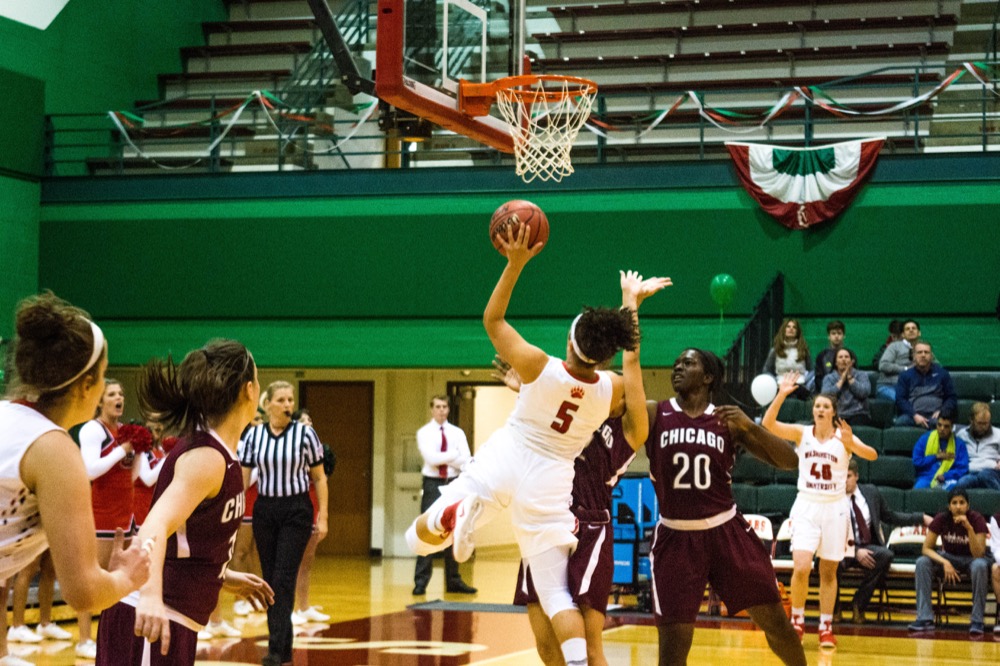 Junior Becca Clark-Callender goes up for a layup in the Bear’s UAA Championship game aganist Chicago last year. The Bears have started out the 2017 season 3-1 with all games played on the road, and the team looks to improve in their first home game of the season this Friday.