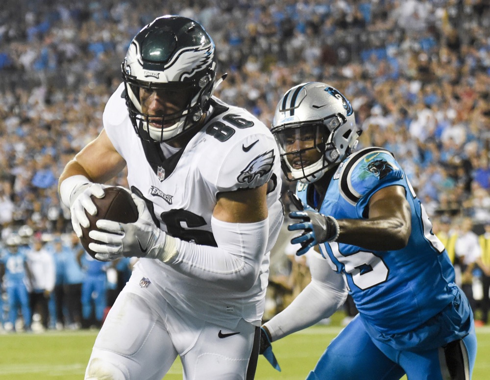 A tight end for the Eagles, Zach Ertz, completes a touchdown pass against the Carolina  Panthers during a regular season game. The Eagles have never before won a Super Bowl.