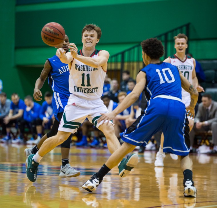 Matt Nester looks to find a teammate during Wash. U.’s NCAA first round matchup with Aurora University. The Bears were picked by many to win a national title this year, but a buzzer-beater by Aurora’s Marcus Myers eliminated them from the tournament in the first game. 