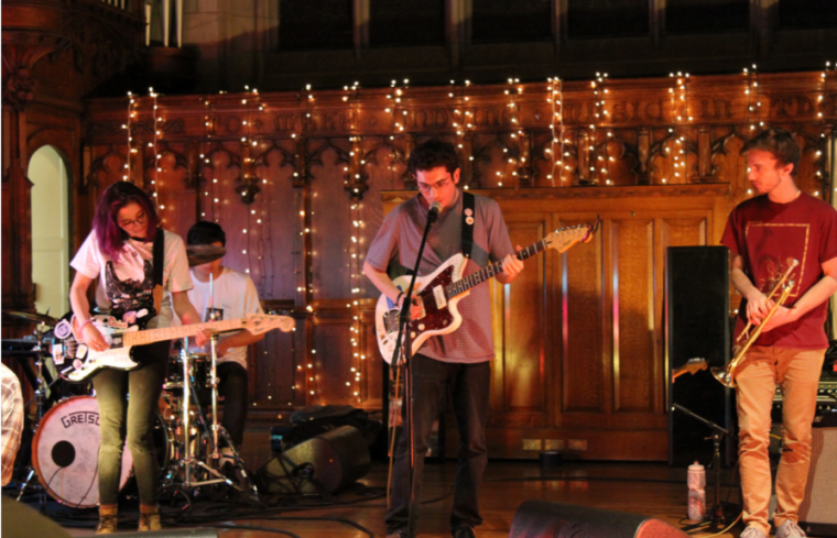 Wash. U. student band American Poetry Club performs on the Graham Chapel stage. The band opened for Mothers on the first night of KWUR Week, a set of events put on by the radio station.