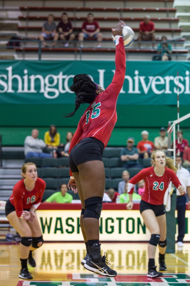 Senior Ifeoma Ufondu spikes the ball against Nebraska Wesleyan. Ufondu led the Bears in kills this weekend and led them to a victory against No. 3-ranked Claremont-Mudd-Scripps Colleges, improving Wash. U.’s overall season record to 8-3.