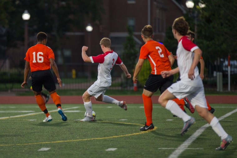 Senior forward Ryan Sproule scores the Bears’ first goal in a 2-0 win over Wartburg College last Friday. Tuesday night, Sproule scored a game-winning goal in overtime against Fontbonne.