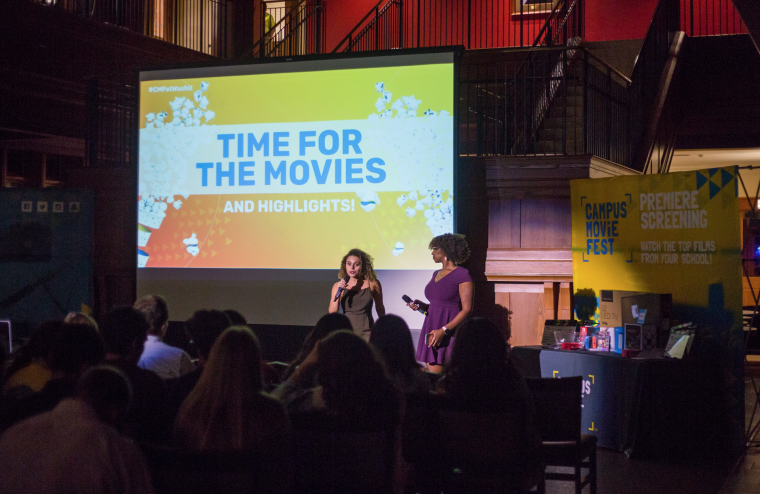 Hosts of the Campus Movie Fest re-introduce student films after taking a break from the screening to give out prizes.