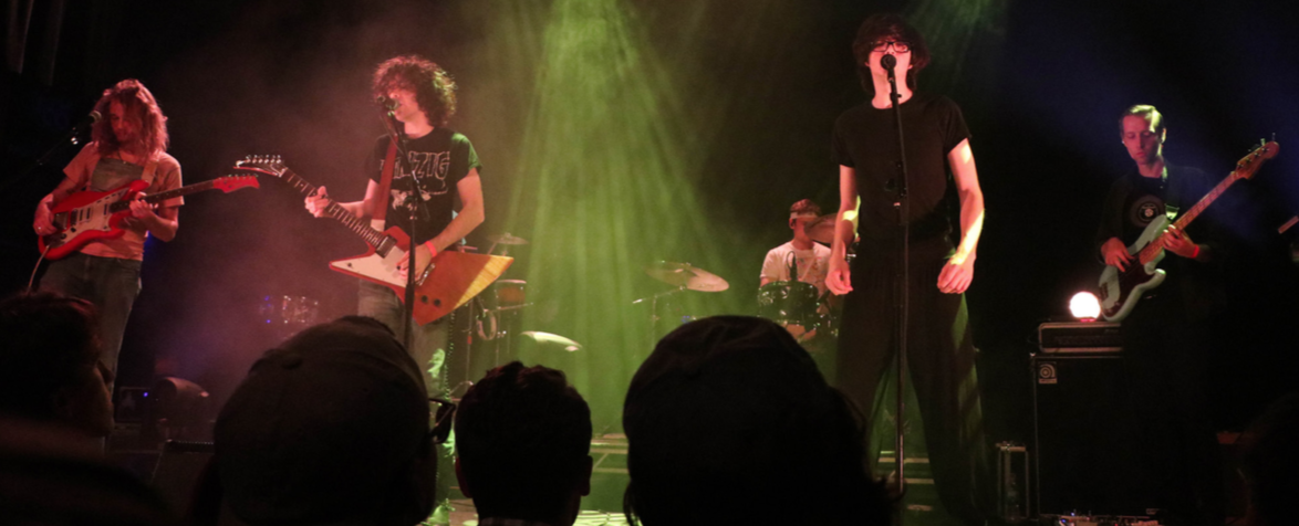 Car Seat Headrest performs at an energized Delmar Hall on Thursday night. The band, led by their frontman and original member Will Toledo, entertained the crowd with a charismatic personality and popular songs such as “Bodys” and “Fill in the Blank."
