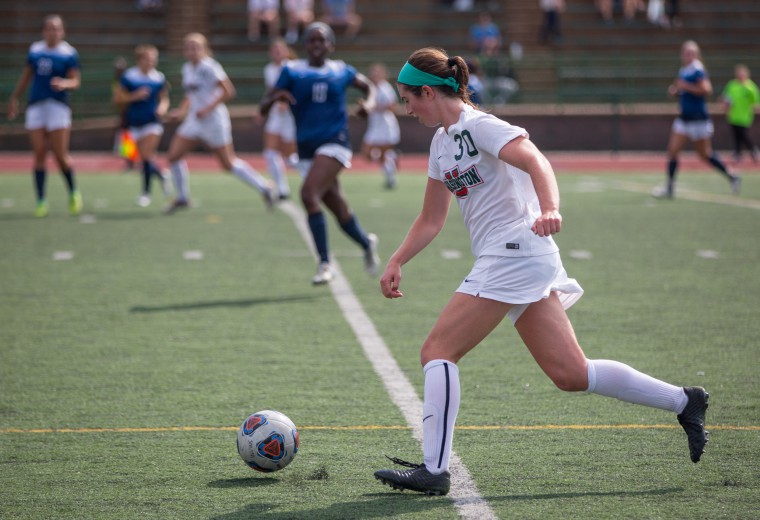 Senior Caroline Dempsey dribbles the ball toward the Emory University goal. The Bears defeated Case Western and No. 21 Carnegie Mellon University to improve to 13-0 this weekend.