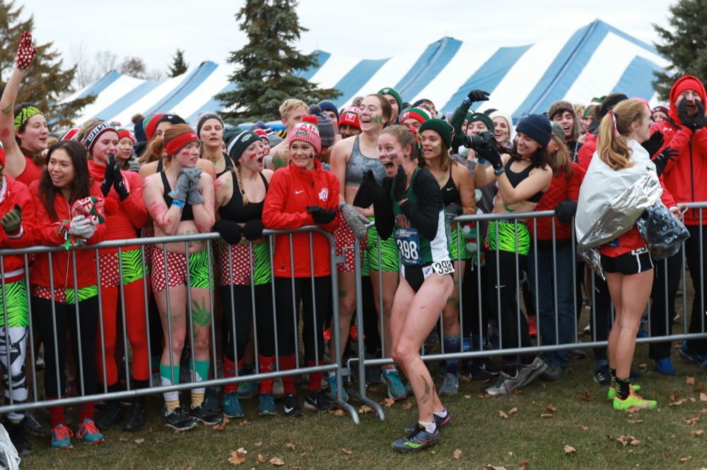 Senior Lisa Gorham reacts to the news that the Washington University women’s cross-country team won the NCAA Division III National Championship. Gorham was one of four Bears with all-American finishes, placing 29th with 21:49.6.