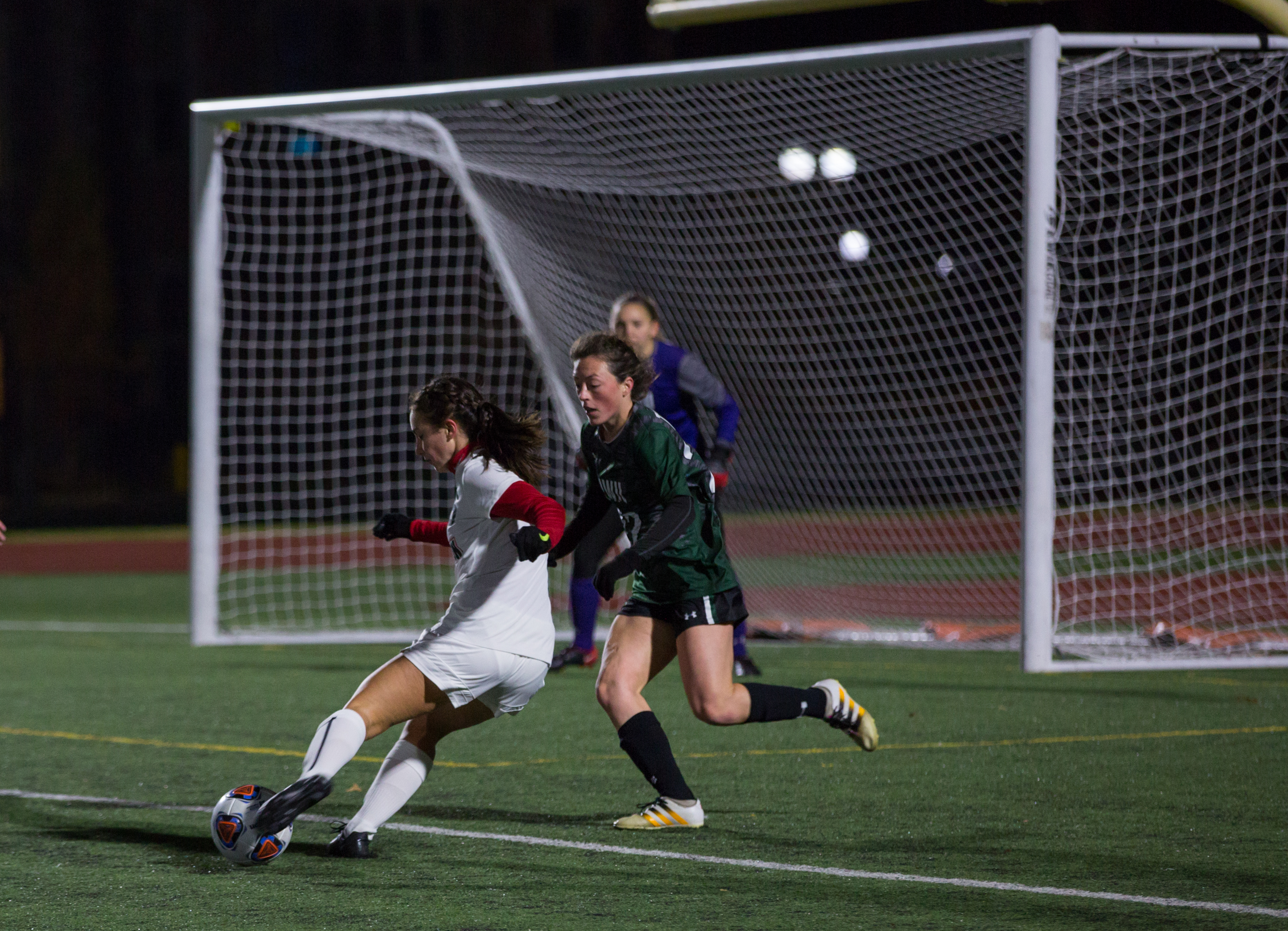 Freshman Erin Flynn takes a shot on goal against Illinois Wesleyan University Sunday. The Bears will advance to the next round of the NCAA Division III Tournament after they defeated Westminster College 5-0 and Illinois Wesleyan 3-0 this weekend.