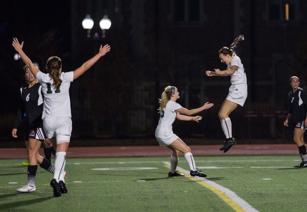 Senior forward Jessica Ridderhoff celebrates with her teammates after scoring a goal against University of Wisconsin-La Crosse, bringing the Bears’ lead to 2-0 to help them secure the win.