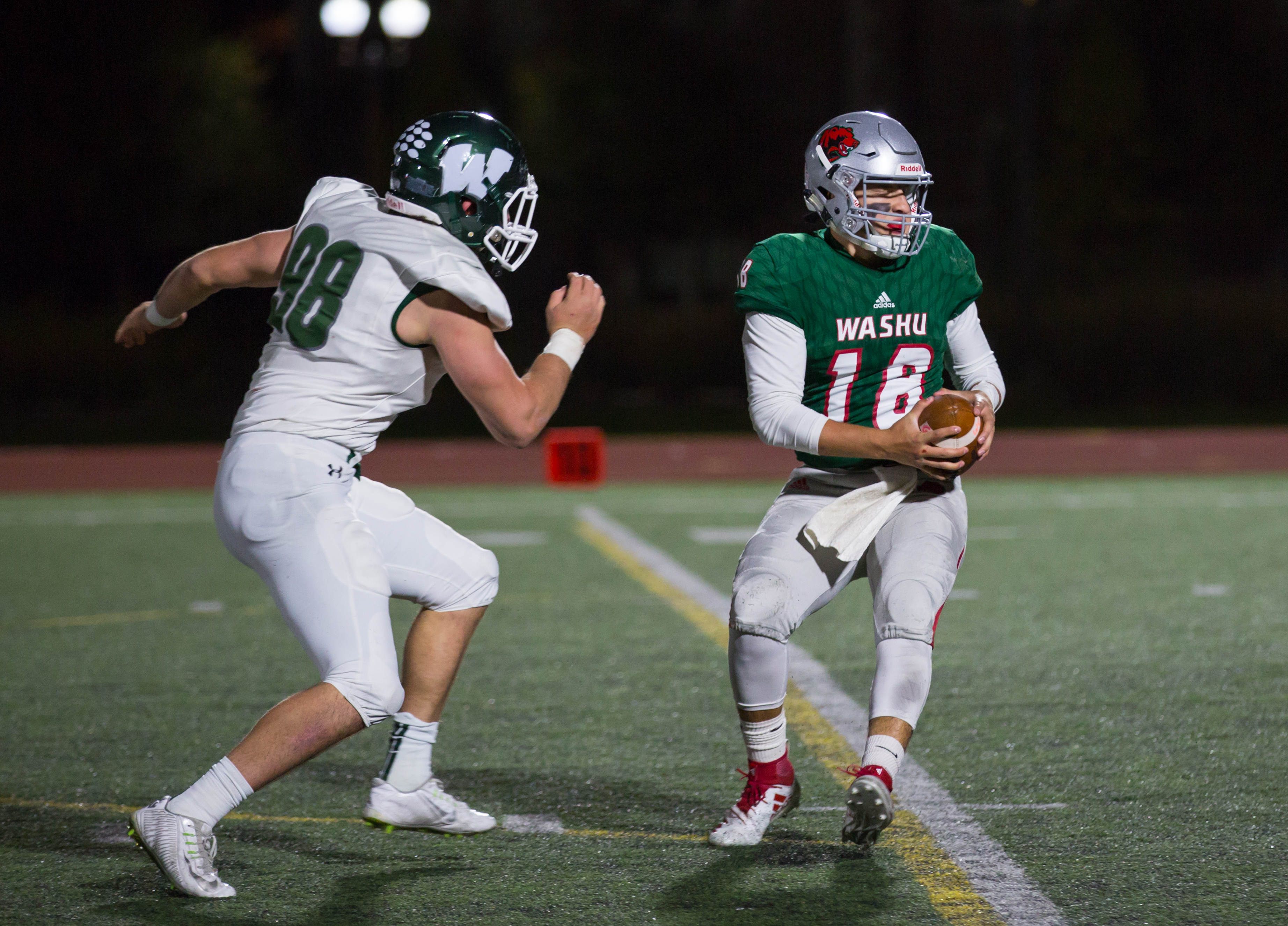 Football comes out on top of slugfest with Millikin, 49-42