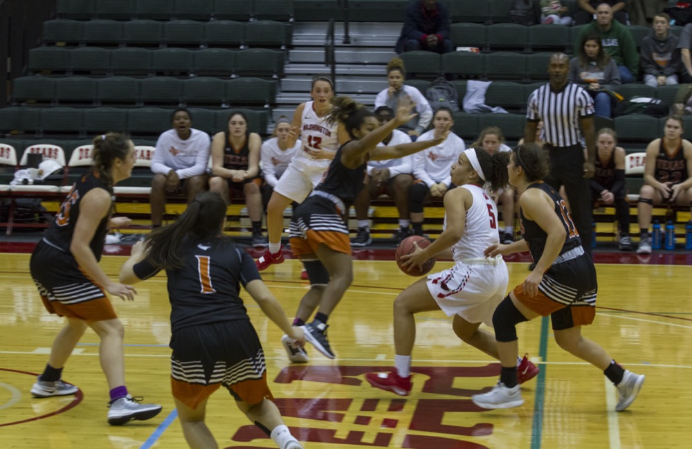 Becca Clark-Callender attracts the attention of the University of Texas at Dallas defenders. The Bears went 1-1 in games against Rose-Hulman and Illinois-Wesleyan Thanksgiving weekend.