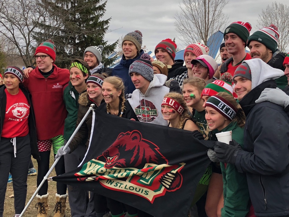 The men’s and women’s cross-country teams celebrate after the women’s team won the  program’s second national title and the men finished second, their best ever NCAA result.
