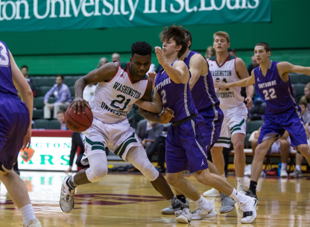 Junior DeVaughn Rucker pushes toward the basket against Fontbonne University defense in December. Friday, Rucker scored 18 as the Bears beat New York University on the road, 91-70.