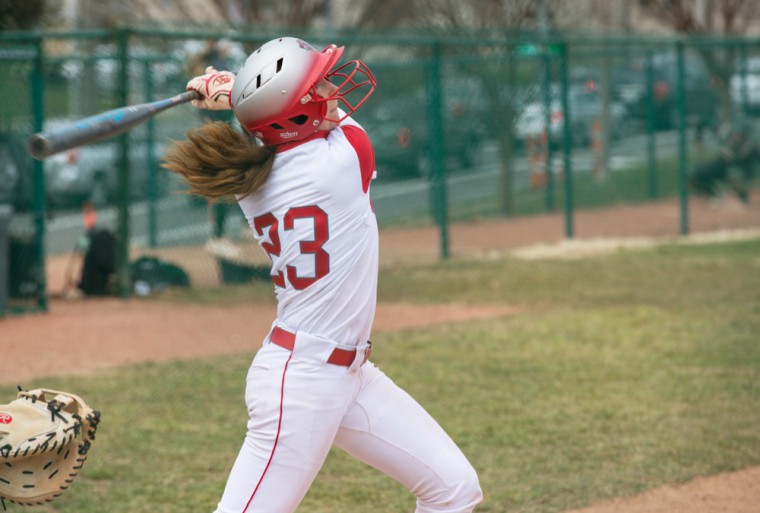 Freshman Kirsten Drabek hits a double for the Bears in the second game of the Schutt Invitational against Illinois Wesleyan University Saturday.
