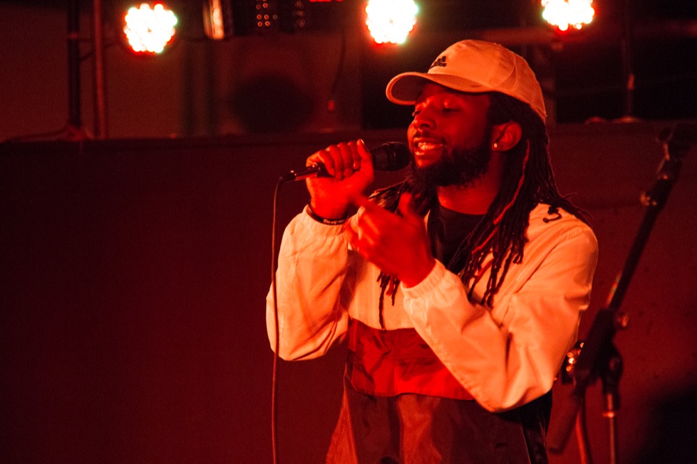Hip-hop artist D’Andre performs at KWUR’s Local Showcase. D’Andre was one of four acts featured in the event Wednesday.