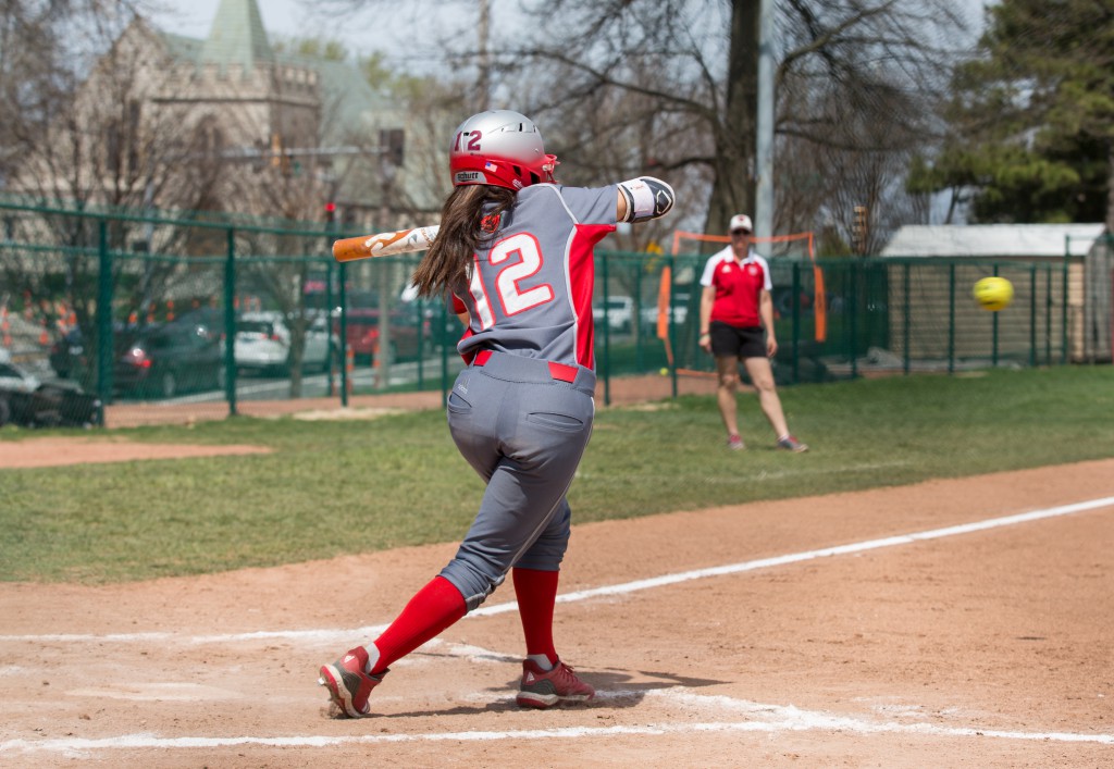 Katie Gould hits against Emory. The Bears won three games against Carnegie Mellon University this weekend.