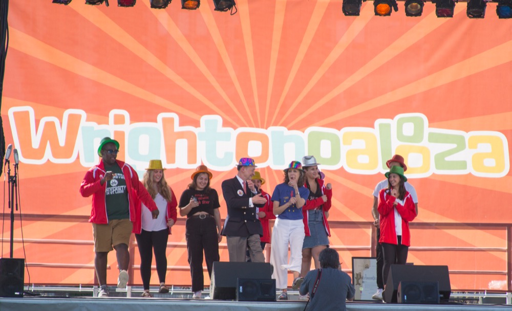 Chancellor Mark Wrighton and his wife Risa Zwerling Wrighton perform a dance with representatives from dance marathon.