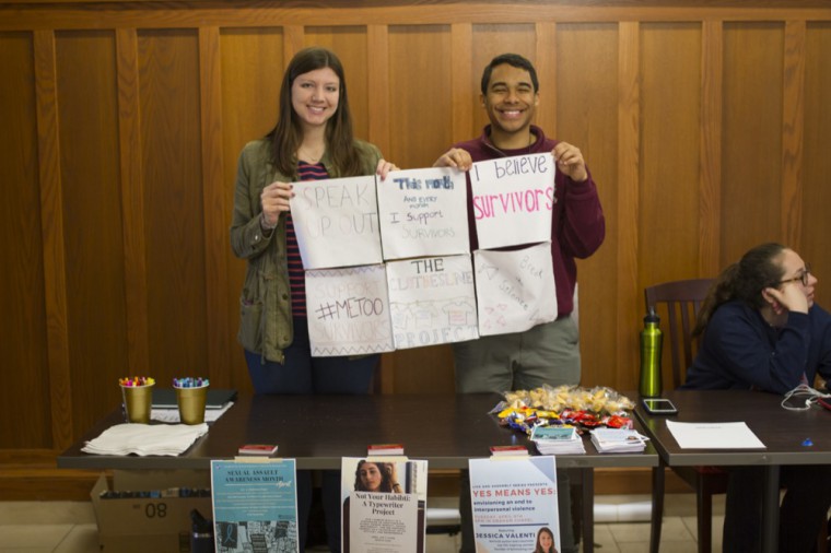 Students from the group Leaders in Interpersonal Violence Education (LIVE) promote the Clothesline Project. LIVE organized the project this week in observance of Sexual Assault Awareness Month.