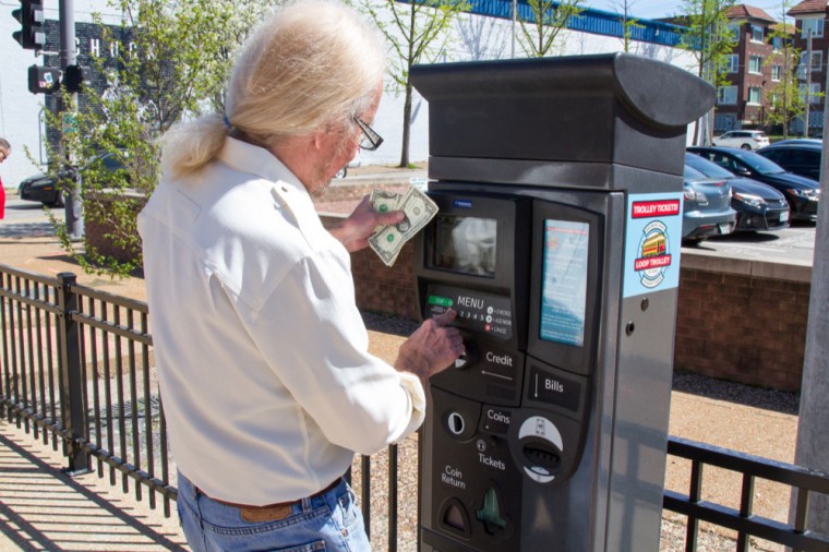 Edwards purchases two tickets for the Loop Trolley.