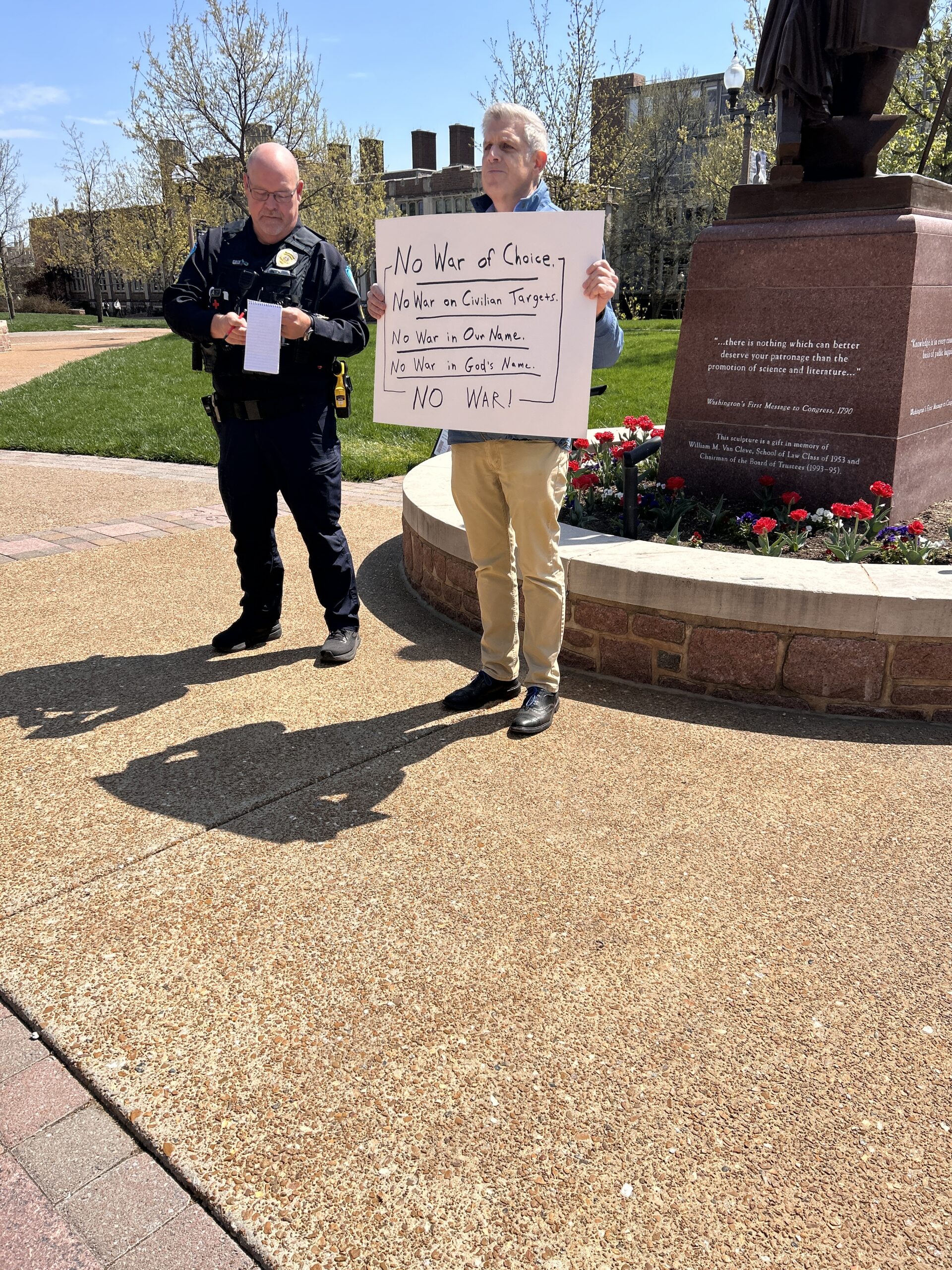 English professor holds solo demonstration against Iran war - Student Life