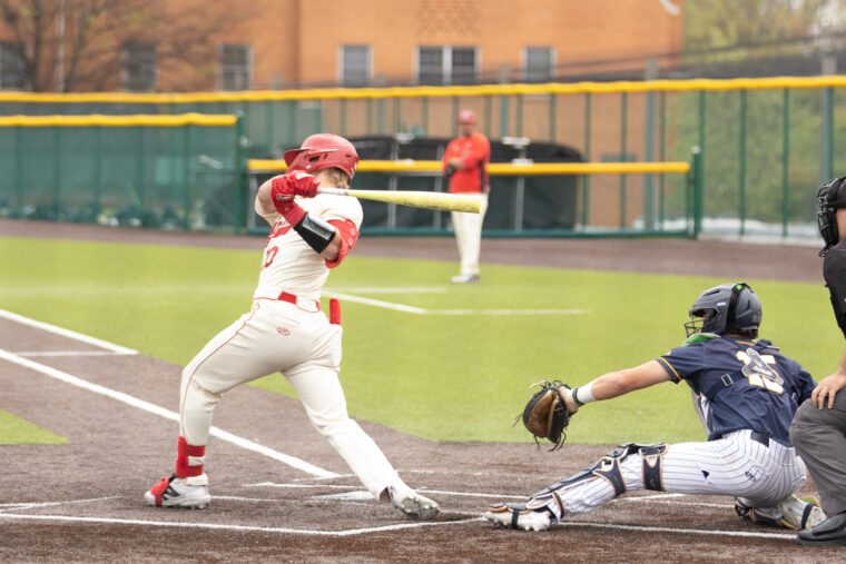 No. 14 baseball wins final two games to force series split against rival Emory